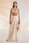 Divya Aggarwal_Ivory Satin Crystals, Pearls, Sequins V-neck Leaf Embroidered Cape Skirt Set _Online_at_Aza_Fashions