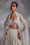 Shop Divya Aggarwal Off White Blouse And Lehenga Silk, Dupatta Organza Crystal, Dorian Bridal Set at Aza Fashions Shop_Divya Aggarwal_Off White Blouse And Lehenga Silk, Dupatta Organza Crystal, Dorian Bridal Set _at_Aza_Fashions