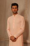 Shop_Vanshik_Peach Georgette Lucknowi Embroidered Kurta Set_at_Aza_Fashions