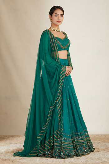 Buy_ASTHA NARANG_Green Net, Crepe, Nylon Sequins, Embroidery, Cut Work Floral Lehenga Set _Online_at_Aza_Fashions