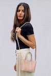 Buy_The House of Ganges_Beige Vegan Leather Small Tote With Sling _at_Aza_Fashions