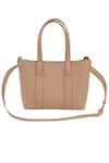 Shop_The House of Ganges_Beige Vegan Leather Small Tote With Sling _at_Aza_Fashions