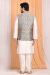 Shop_Aryavir Malhotra_Silver Jacquard Silk Woven Geometric Bundi And Kurta Set_at_Aza_Fashions