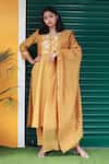 TINA EAPEN COLLECTIVE_Yellow Cotton Silk Woven Floral V Neck Kurta And Pant Set _Online_at_Aza_Fashions