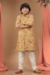 Kora By Nilesh Mitesh_Yellow Cotton Printed And Embroidered Floral & Thread Straight Kurta Set _Online_at_Aza_Fashions