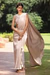 Tarini Vij_Gold Bremberg Lycra Satin And Net Pleated Stitched Saree With Pearl Blouse _Online_at_Aza_Fashions