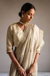 Shorshe Clothing_Ivory Handloom Tissue Hand Embroidered And Embellished Pearl Zari Saree _Online_at_Aza_Fashions
