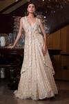 Buy_Sawan Gandhi_Beige Lehenga Set With Organza Cape_at_Aza_Fashions