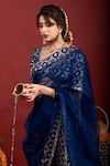 Shop_Monk & Mei_Blue Brocade Floral V Neck Sevati Pattern Sharara Saree With Blouse _at_Aza_Fashions