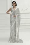 Shop_Manish Malhotra_White Georgette Sequin Embroidered Saree With Blouse_at_Aza_Fashions