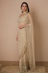 Buy_Astha Narang_Off White Net Embroidered Nakshi Scoop Neck Sequin Saree With Blouse  _Online_at_Aza_Fashions