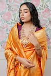 Buy_Paaprika_Orange Pure Spun Silk Handwoven Zari Floral And Stripe Pattern Saree _Online_at_Aza_Fashions