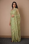 Buy_Astha Narang_Green Net Embroidered Nakshi Scoop Neck Sequin Saree With Blouse For Women_Online_at_Aza_Fashions