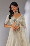 Shop_Neha Khullar_Ivory Organza Embroidery Cutdana Wide V Silk Bridal Lehenga Set _Online_at_Aza_Fashions