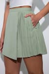 Buy_Pocketful Of Cherrie_Green Crepe Plain Short Pleated Skirt _Online_at_Aza_Fashions