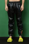Buy I Am Trouble By KC Black Holographic Quilted Joggers Online at Aza Fashions Buy_I Am Trouble By KC_Black Holographic Quilted Joggers_Online_at_Aza_Fashions