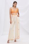 Shop_Surily G_White Crepe Layered Flared Pants  _at_Aza_Fashions