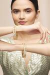 Buy_Moh-Maya By Disha Khatri_Gold Plated Imitation Diamonds Studded Bangles Set Of 4_Online_at_Aza_Fashions