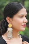 Shop_Arnimaa_Silver Plated Stones Chandani Peacock Carved Earrings _Online_at_Aza_Fashions