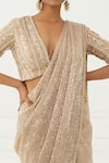 Shop_Nidhika Shekhar_Beige Crepe Embroidery V Neck Sequin Pre-draped Saree With Blouse For Women_Online_at_Aza_Fashions