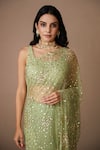 Shop_Astha Narang_Green Net Embroidered Nakshi Scoop Neck Sequin Saree With Blouse For Women_Online_at_Aza_Fashions