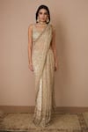 Shop_Astha Narang_Off White Net Embroidered Nakshi Scoop Neck Sequin Saree With Blouse For Women_Online_at_Aza_Fashions