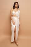 Ahi Clothing_Off White Shimmer Lycra Kodi Tassels One Shoulder Twisted Top And Draped Skirt Set _at_Aza_Fashions