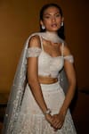 Nadine Dhody Off White Tulle Crystals, Sequins, Embroidery Sophie Hand Lehenga Set Online at Aza Fashions Nadine Dhody_Off White Tulle Crystals, Sequins, Embroidery Sophie Hand Lehenga Set _Online_at_Aza_Fashions