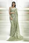 Shop_Manish Malhotra_Green Georgette Embroidered Saree With Blouse_at_Aza_Fashions