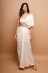 Buy_Ahi Clothing_Off White Shimmer Lycra Kodi Tassels One Shoulder Twisted Top And Draped Skirt Set 