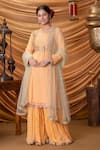 Buy Ruh Clothing Orange Net, Georgette Mukaish Round Embroidered Sharara Set at Aza Fashions Buy_Ruh Clothing_Orange Net, Georgette Mukaish Round Embroidered Sharara Set _at_Aza_Fashions
