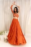 Shop_Silky Bindra_Orange Tulle Net One Shoulder Embroidered Lehenga Set_at_Aza_Fashions