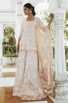 Buy Manish Malhotra Peach Net Embroidered Kurta Sharara Set at Aza Fashions Buy_Manish Malhotra_Peach Net Embroidered Kurta Sharara Set_at_Aza_Fashions