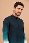 Hilo Design_Green Falling Raw Silk Embroidery Lion Face Motif Leonine Straight Kurta _at_Aza_Fashions