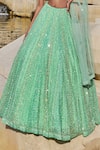 Seema Gujral_Green Net Embroidery Sequin One Shoulder Blouse And Lehenga Set _Online_at_Aza_Fashions