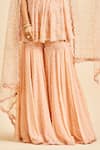 Nitika Gujral_Peach Peplum Top And Sharara Georgette & Dupatta Net Embroidery Sequin Set _Online_at_Aza_Fashions