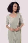 Shop_Onaya_Green Lycra Embroidery Pre-draped Lace Trim Saree With Work Blouse _Online_at_Aza_Fashions