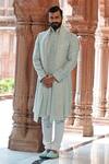 Vanshik_Green Raw Silk Embroidered Sherwani Set _Online_at_Aza_Fashions