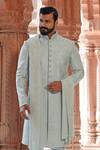 Vanshik_Green Raw Silk Embroidered Sherwani Set _at_Aza_Fashions