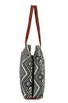 Shop_NR BY NIDHI RATHI_Black Woven Jacquard Bag _Online_at_Aza_Fashions