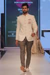 Buy_Nivedita Saboo_Off White Bandhgala Woven Hand With Pocket Square And Breeches  _at_Aza_Fashions