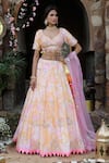 Nitisha Kashyap Official_Pink Net, Silk Sequins, Beads Asymmetric Tie And Dye Embroidered Lehenga Set _Online_at_Aza_Fashions