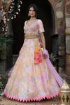 Shop_Nitisha Kashyap Official_Pink Net, Silk Sequins, Beads Asymmetric Tie And Dye Embroidered Lehenga Set _Online_at_Aza_Fashions