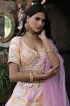 Nitisha Kashyap Official_Pink Net, Silk Sequins, Beads Asymmetric Tie And Dye Embroidered Lehenga Set _at_Aza_Fashions