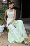 Nitisha Kashyap Official_Off White Silk Beads, Zari, Embroidery, Mirrors Peplum Top And Sharara Pant Set _at_Aza_Fashions