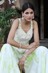 Buy_Nitisha Kashyap Official_Off White Silk Beads, Zari, Embroidery, Mirrors Peplum Top And Sharara Pant Set 