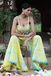 Nitisha Kashyap Official_Yellow Silk Mirrors, Beads, Embroidery, Floral Bustier And Gharara Pant Set _at_Aza_Fashions