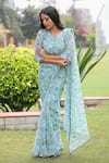 House of Tushaom_Green Georgette Printed Tropical Round Saree With Peplum Blouse  _Online_at_Aza_Fashions