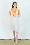 Jyoti Bansal_White Cambric Cotton Chequered Yoke Round Three Quarter Sleeve Pattern Tunic _Online_at_Aza_Fashions