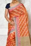 Shop_Nazaakat by Samara Singh_Orange Banarasi Cotton Silk Woven Floral Stripe Pattern Saree_Online_at_Aza_Fashions
